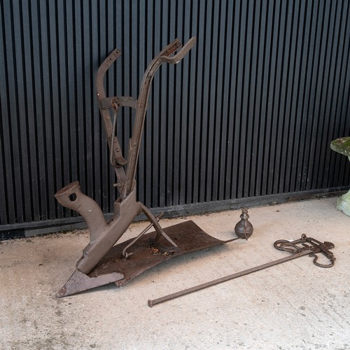 548 - Vintage cast iron Italian hand plough, along with a set of iron grain sack scales.