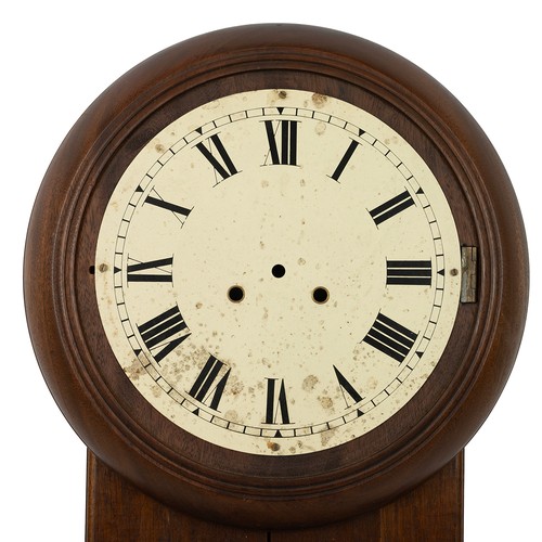 502 - Mahogany cased wall clock, with a white dial and Roman numerals and with a pendulum.