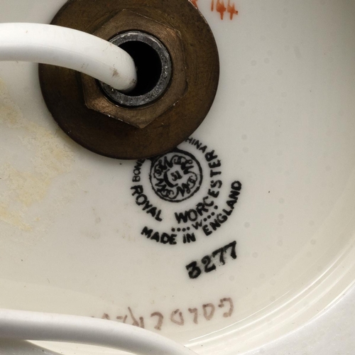 186 - E.Townsend for Royal Worcester a trophy form lamp, c1958, hand painted with a Bullfinch and a Goldcr... 