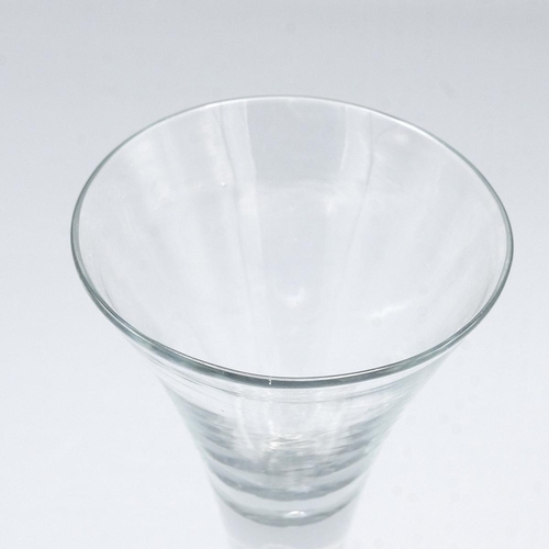 200 - Georgian trumpet shaped wine glass with tear drop in the stem raised on a stepped base H15.5m.