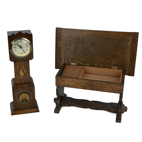 207 - Apprentice pieces: an oak refectory table, the lid lifting to reveal a music box and storage compart... 