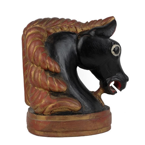 208 - Carved wood polychrome horse head. Black and red with gilt highlights. H 38cm, W 20cm, D 34cm.