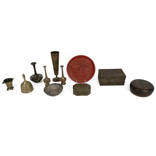 233 - Collection of miscellaneous Oriental items to include nine metal works, one wooden vessel with cover... 