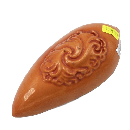 238 - A Chinese monochrome glazed porcelain vessel, 20th-century. Of leaf shape, glazed in coral, a moulde... 