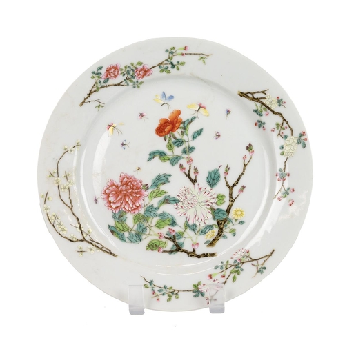 240 - A Chinese Famille Rose plate. Decorated with various blossoms including apple, pear, peonies etc. To... 