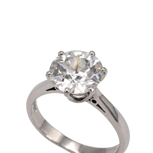 1 - A diamond solitaire ring, the old European cut weighing approximately 3.20 carats, in a six-claw set... 