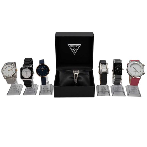 20 - Quantity of quartz fashion watches including: Kenneth Cole, Moschino, Christian Lars, Guess, Obaku a... 