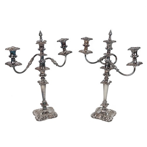 26 - Pair of tall Sheffield plate candelabra, mid 19th Century. Neoclassical form, removable drip trays a... 