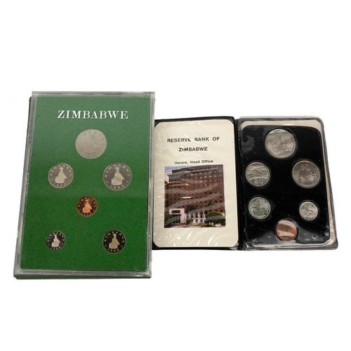 32 - World coins, to include Maria Theresa Thalers (2), 1970s Rhodesian coin set (2), banknotes, 1980 Zim... 