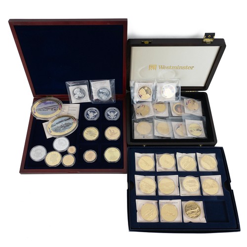 36 - Commemorative boxed coin sets, Westminster. Including: Greatest US coin replicas, Royal and WW2 comm... 