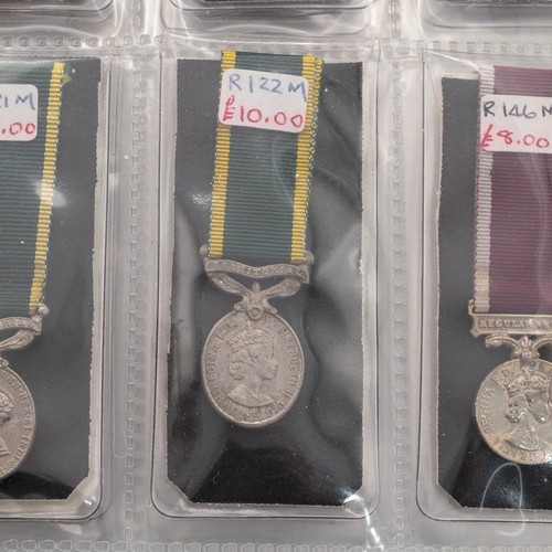 56 - Collection of military and civil miniature medals. Including OBE, Queens South Africa Medal with 4 c... 