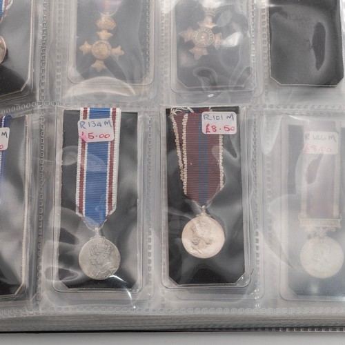 56 - Collection of military and civil miniature medals. Including OBE, Queens South Africa Medal with 4 c... 