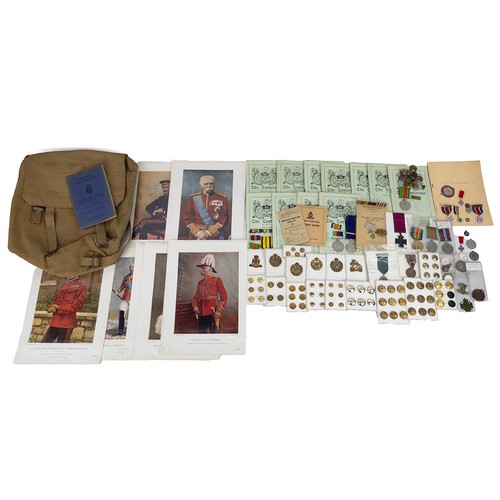 58 - Military group - cap badges, buttons, medals, books, ephemera and WW2 rucksack.