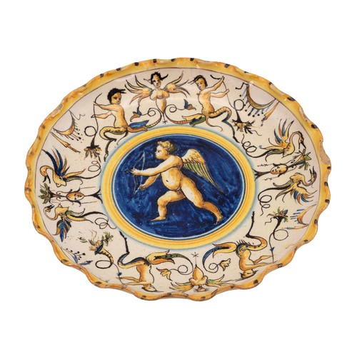 80 - 16th Century style Italian Majolica footed bowl decorated with a cherub to the well and a border of ... 