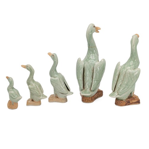 84 - A graduated set of five Chinese ceramic ducks in a celadon glaze with impressed marks to base. Talle... 