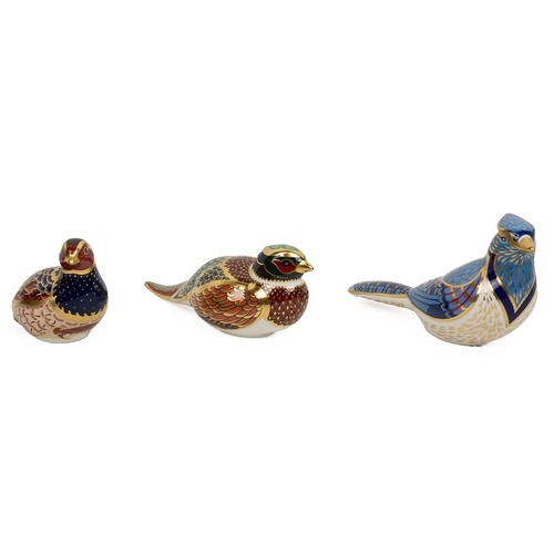 97 - Royal Crown Derby paperweights to include a Woodland Pheasant (silver stopper), Blue Jay (silver sto... 