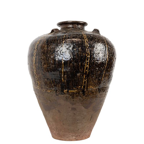 111 - A large Southeast Asian martaban jar with a collar rim, shouldered form with three applied loop hand... 