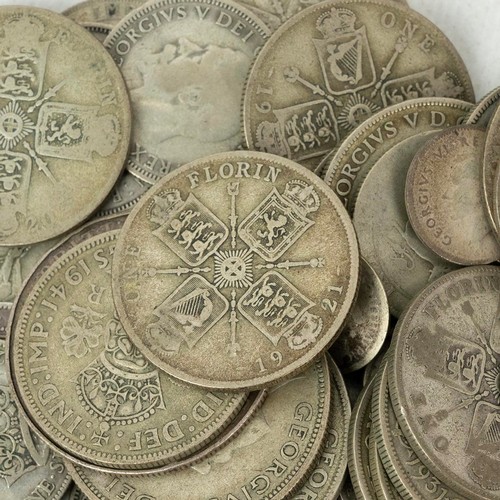 33 - UK and world coinage to include 425 grams of pre-1947 50% silver, commemorative crowns and an SS Can... 