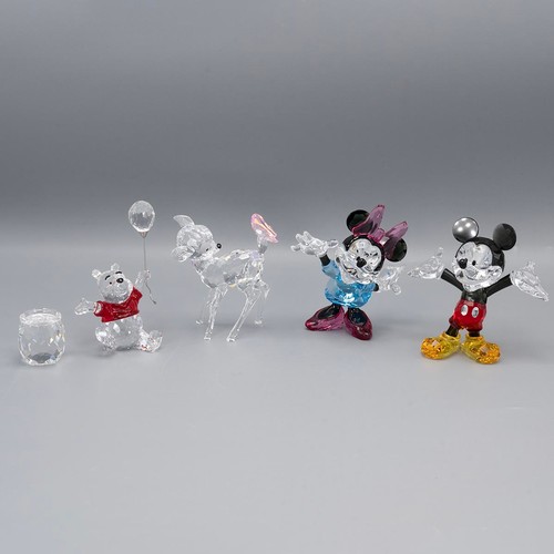 116 - A collection of five Swarovski crystal Walt Disney and friends characters, to include, Mickey Mouse,... 