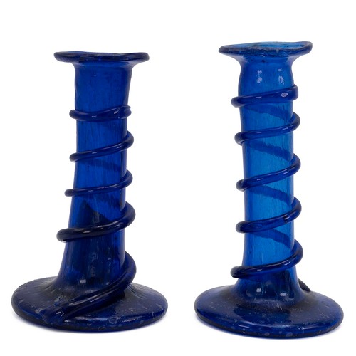 125 - Blue glass to include a small goblet with snapped pontil, the base broader than the cup (H 11cm), to... 