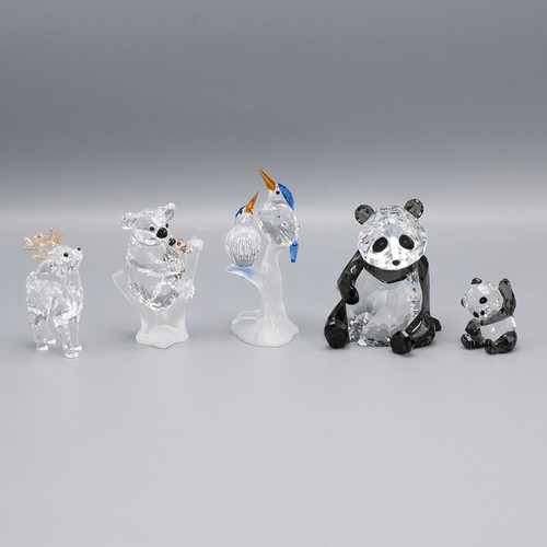 129 - A collection of Swarovski crystal animals, to include a small stag, panda and cub, pair of kingfishe... 