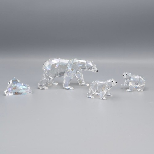 134 - Swarovski Crystal Society 'Siku Polar Bear' with certificate and two polar bear cubs, in original bo... 