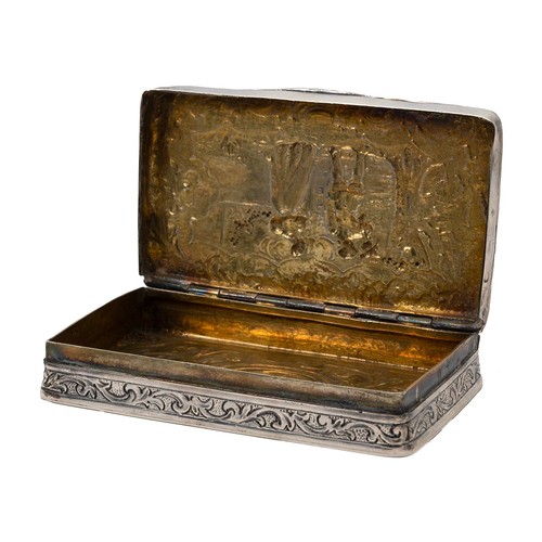 228 - Naval and Naval Interest: A silver gilt (tested as 925) metal snuff box decorated with repousse work... 