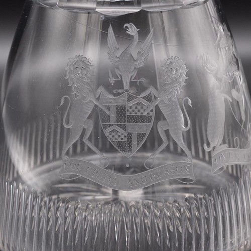 233 - A near pair of late Georgian style magnum cut glass ship's decanters each with three neck rings, mus... 