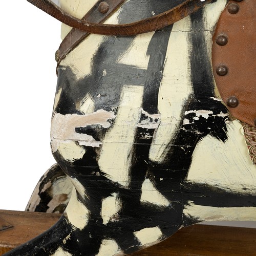 287 - 20th century pine rocking horse, painted in black and white throughout with horse hair tail and mane... 