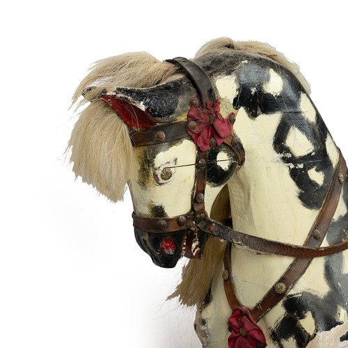 287 - 20th century pine rocking horse, painted in black and white throughout with horse hair tail and mane... 