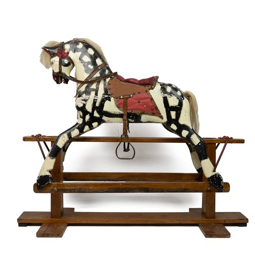 287 - 20th century pine rocking horse, painted in black and white throughout with horse hair tail and mane... 