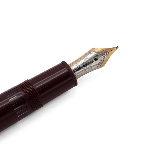 381 - Mont Blanc MeisterStuck set in burgundy comprising fountain pen with 14k gold nib (DD1131237), ballp... 