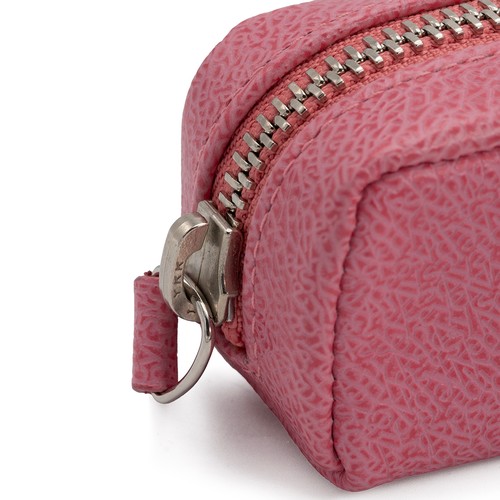 390 - Asprey of London: a pink leather make up case with zip. 18cm x 4.5cm x 4cm.