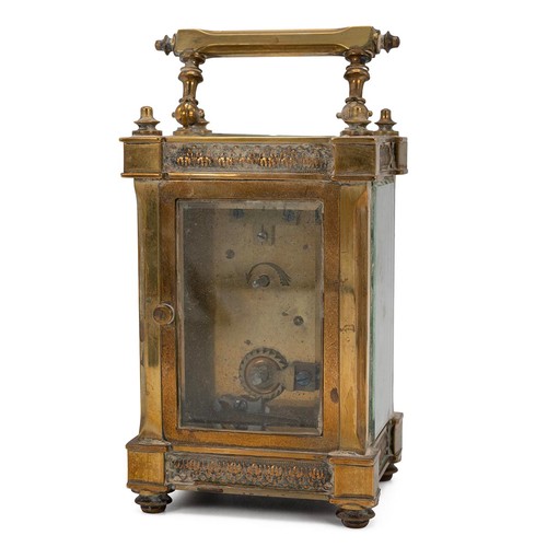 426 - 19th century brass cased carriage clock with bevelled glass panels, enamelled chapter ring with Arab... 