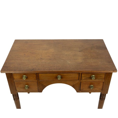 453 - Mid 19th Century mahogany low boy / desk. Five drawers with stamped brass knobs, turned ring legs. W... 