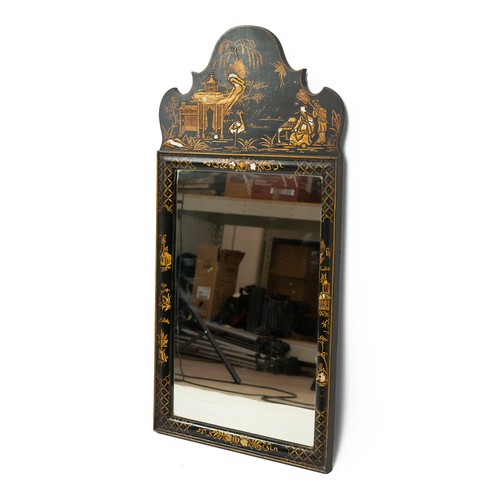 456 - 20th Century chinoiserie wall mirror, decorated with typical scenes and having shaped top, 78cm x 41... 