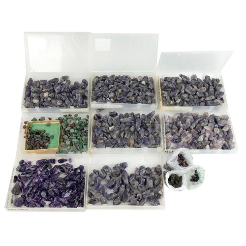 194 - Collection of rough, uncut, polished gemstones, mostly amethyst, tourmaline and others.