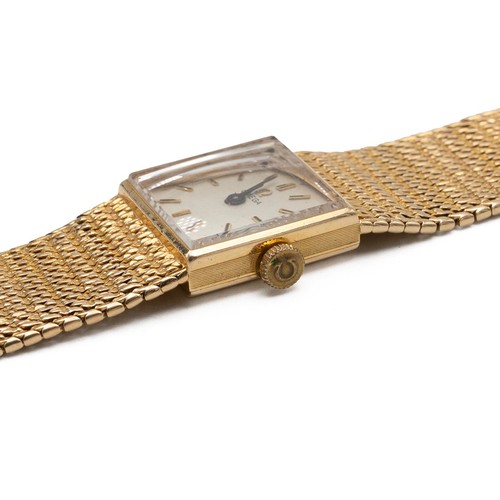 197 - Omega 9ct gold lady's wristwatch. Quartz, 28x28mm square case, silvered dial with gilt baton markers... 