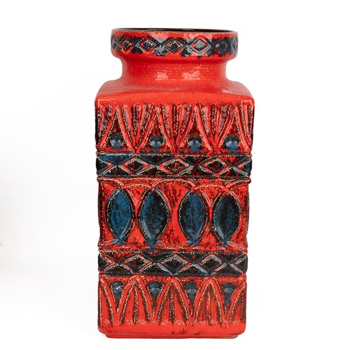 96 - West German Bay Pottery floor standing vase of square form with circular raised rim, red glazed grou... 