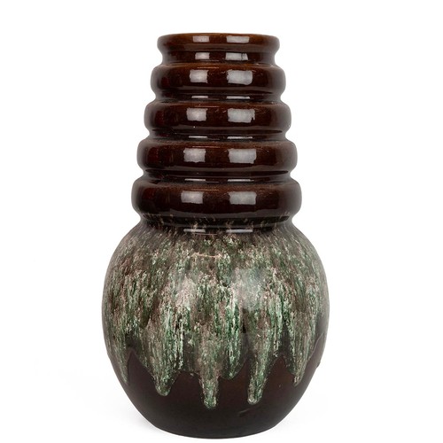 101 - West German floor standing pottery vase with ribbed neck over spherical base glazed in browns and ma... 