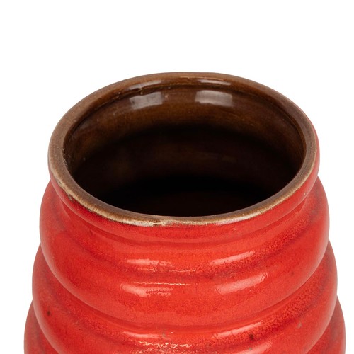 102 - West German floor standing pottery vase with ribbed neck over spherical base glazed in crimson  and ... 