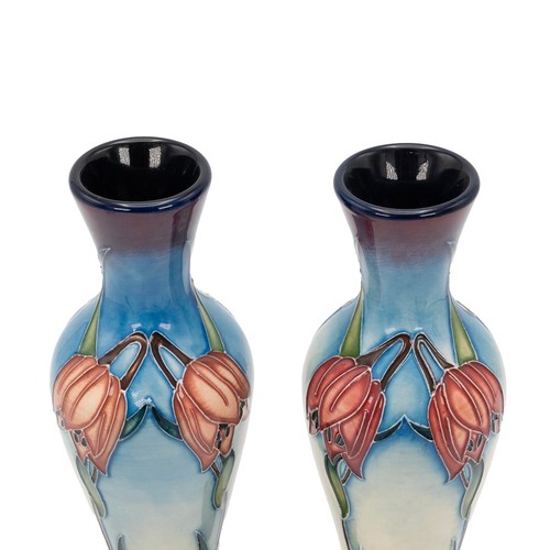 128 - Nicola Slaney for Moorcroft, painted by Vicky Lovatt, a pair of long necked vases with snakeshead fr... 