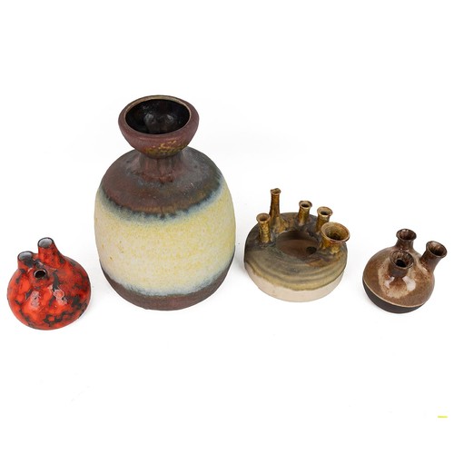 125 - West German pottery to include a large bottle vase and three smaller spouted vases.