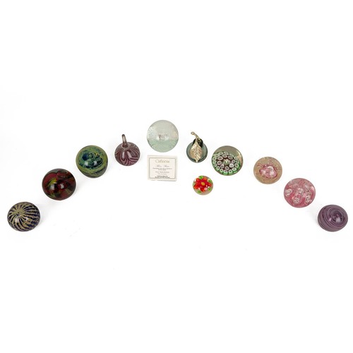 183 - A collection of 11 paperweights, including Caithness, including a boxed 'Silver Rain', Mdina and var... 