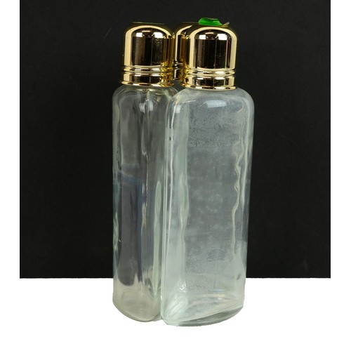 191 - A cased triple hunting decanter & shot glasses set, the upper section containing three gilt topp... 