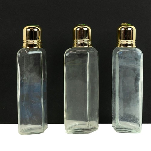 191 - A cased triple hunting decanter & shot glasses set, the upper section containing three gilt topp... 