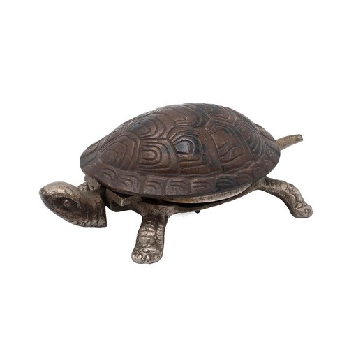 38 - A nickel plated and painted Tortoise desk bell, with clock work wind mechanism to the base in workin... 