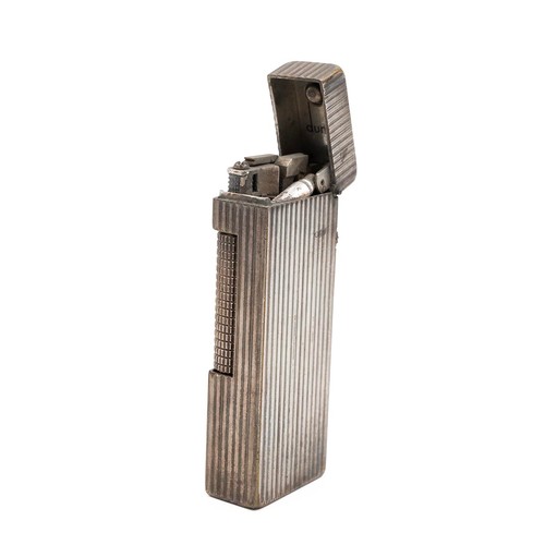 23 - A vintage Dunhill Rollagas silver plated lighter, with ribbed body, reg no. 24163 length 6.5cm, unbo... 