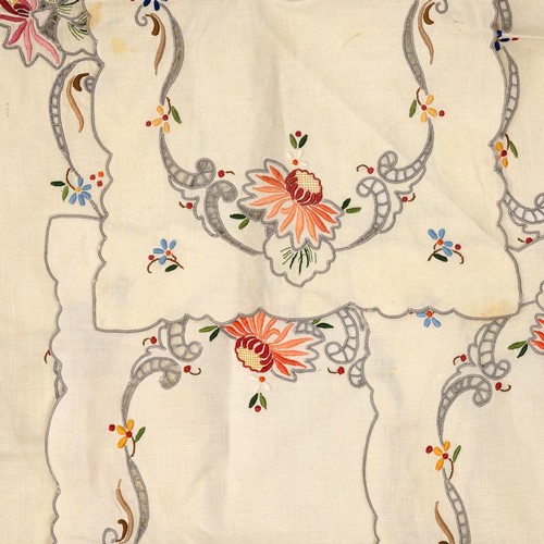 247 - A collection of ooriental floral embroidered linen tablecloths and accessories