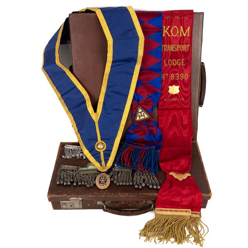 261 - A large collection of Masonic medals, aprons, and accessories in three leather suitcases.